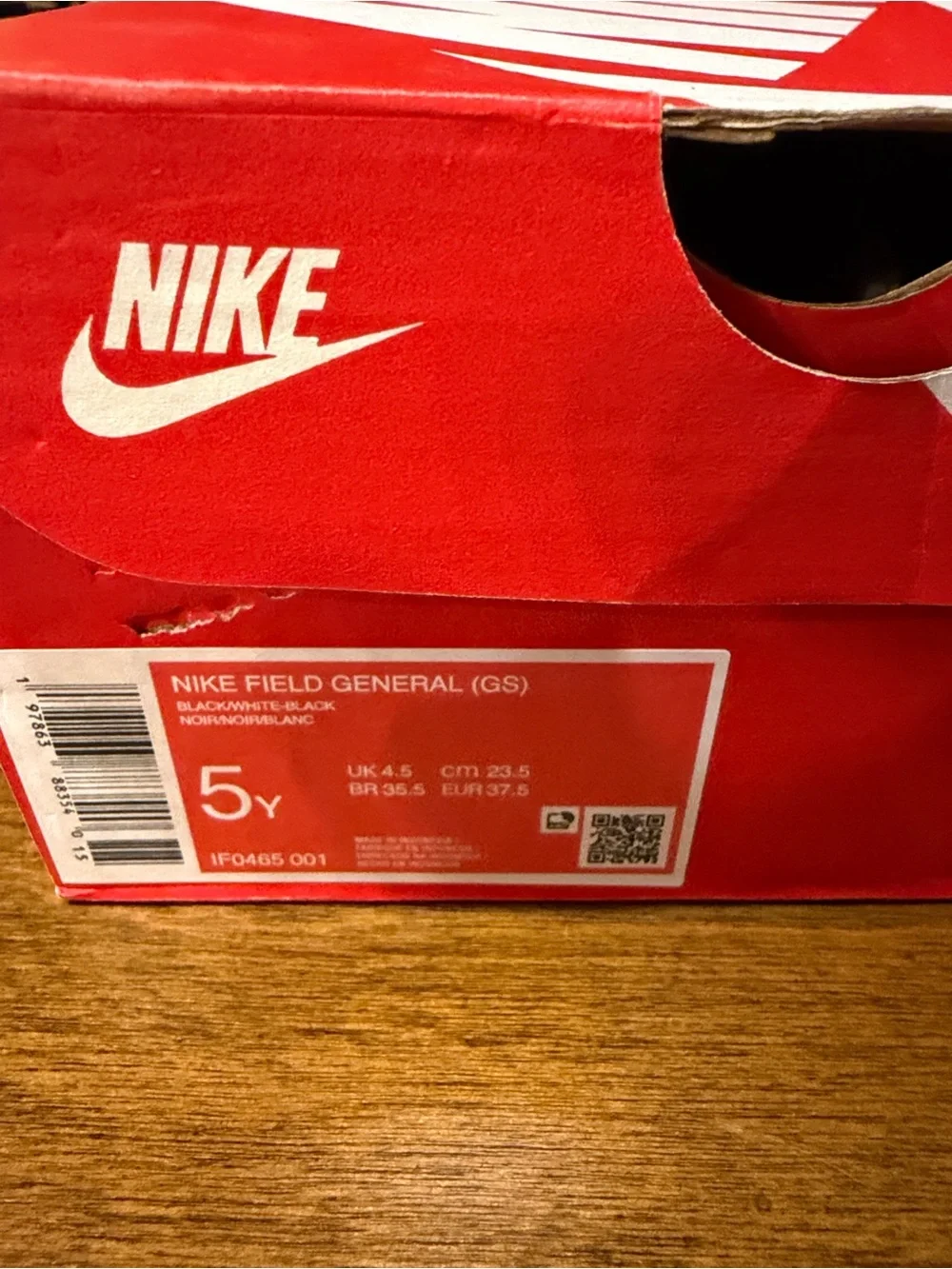 Nike Kids Black Sneakers with White Swoosh